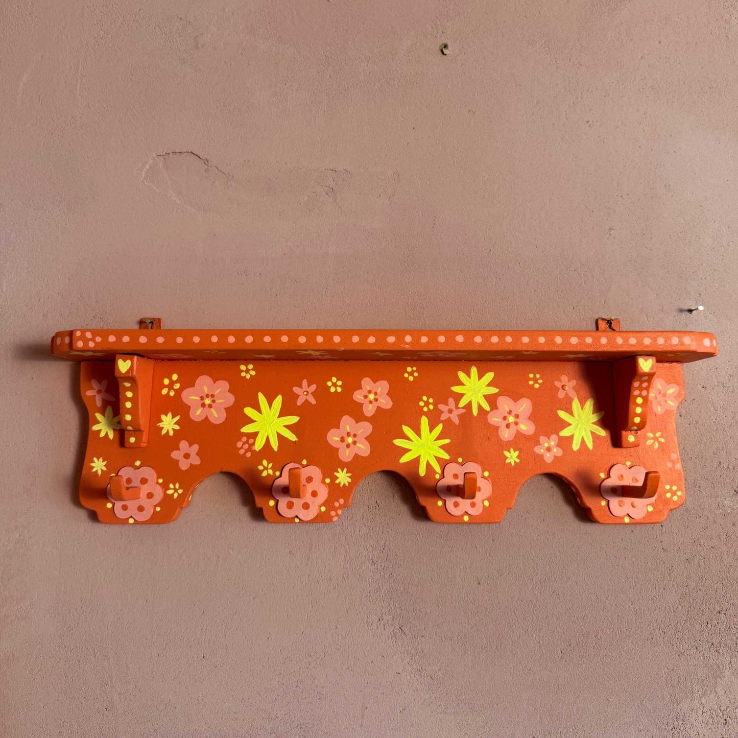 Orange coat rack