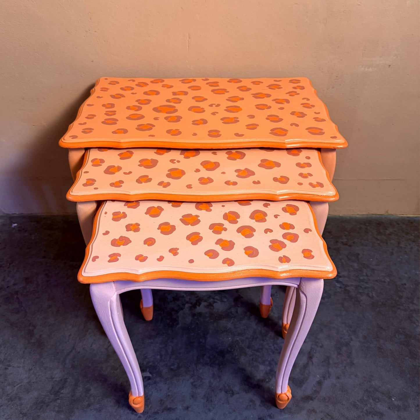 3 leopard pink tables